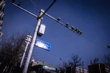 Street pole with several surveillance cameras