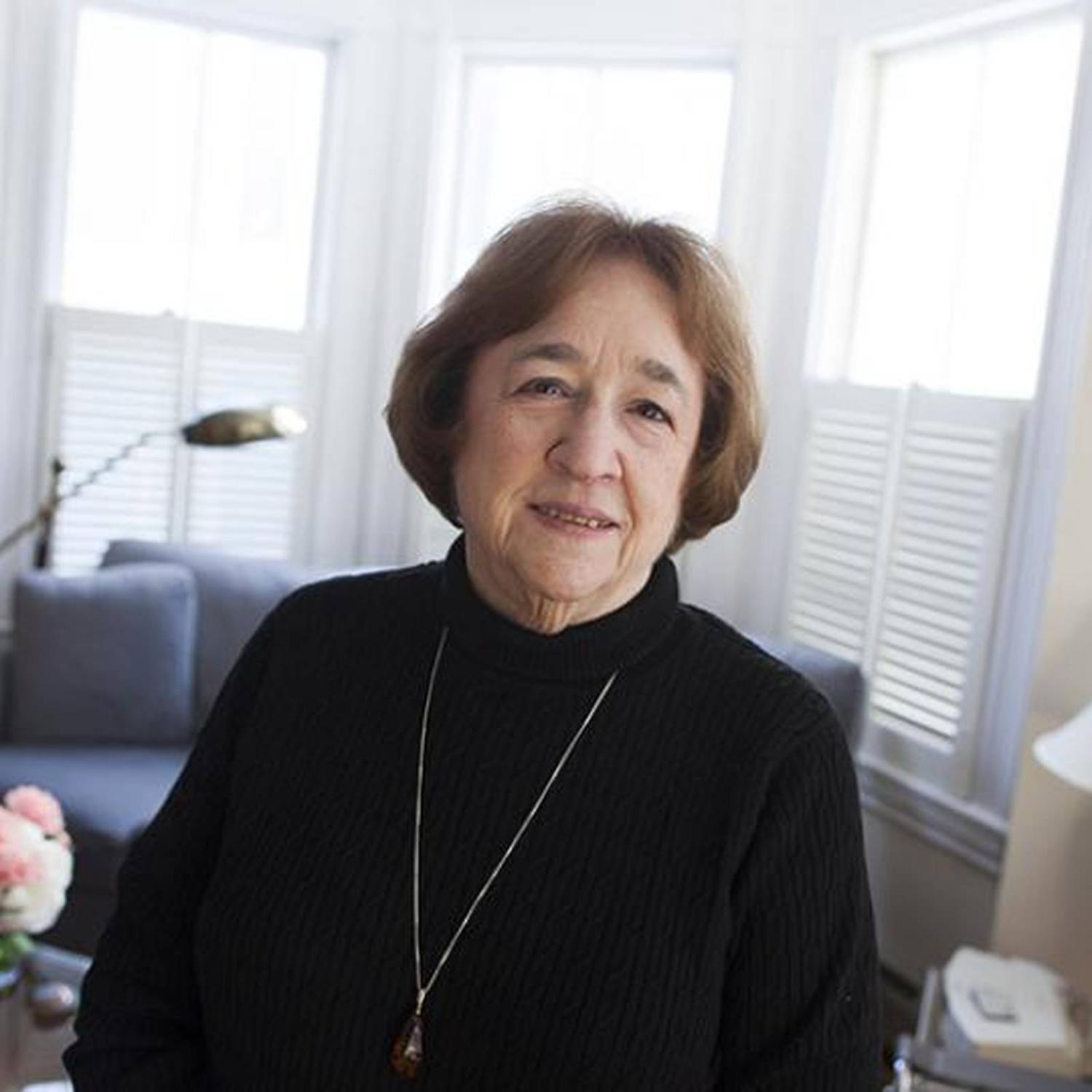 Helen Vendler looks into the camera while wearing a black shirt.