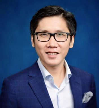 Portrait of a man wearing a blue suit