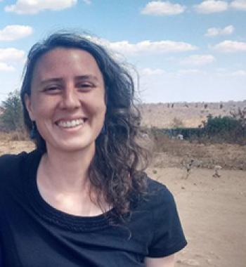 Jocelyn Moon stands outside wearing a dark shirt.