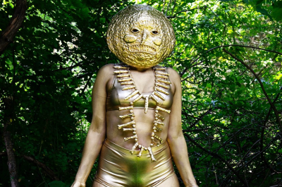 Person painted in gold art