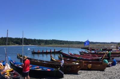 Canoe families request permission to come ashore to the Port Gamble S'Klallam Tribe during the 2018 Power Paddle to Puyallup Canoe Journey.