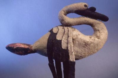 Felted Swan by Pazyryk Culture. 5th - 4th century BCE. Shades of blue in the background with a swan made of felt in the foreground.