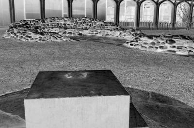 An inverted black and white image of "Blocked Out," a monument on the University of Washington Seattle campus.