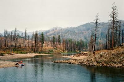 Pepole recreating in burnt smoky landscape