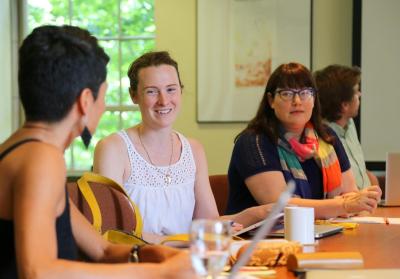 Fellows engaged in a conversation