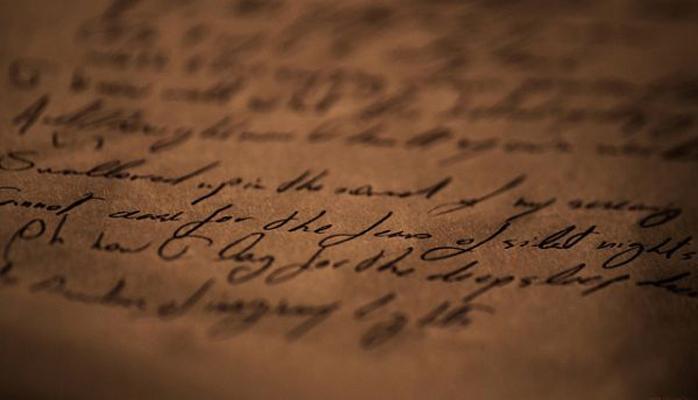 Close-up of cursive writing on paper