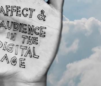 Black and white photo of a hand with the title "Affect and Audience in the Digital Age" written on it in front of a blue sky