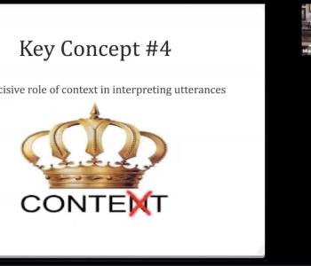 A slide from Professor Brian Baer's talk that reads, "Key Concept #4: The decisive role of context in interpreting utterances," and a a crown above the word "CONTENT" with the "N" marked over with an "X." Professor Baer is visible in the top right corner