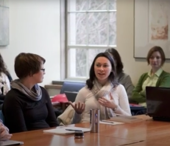 Members of the Teaching with Technology interest group talk.