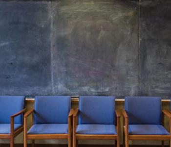 Row of Empty Simpson Center Conference Chairs