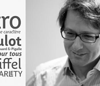 A black and white image of Type Designer Jean François Porchez with the French words on the left hand side.