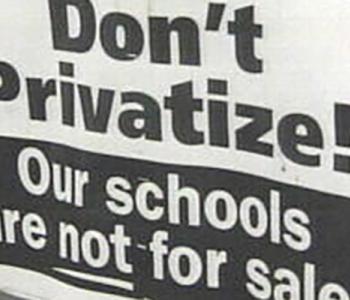 Photo of a sign with the words Don't Privatize! Our schools are not for sale.