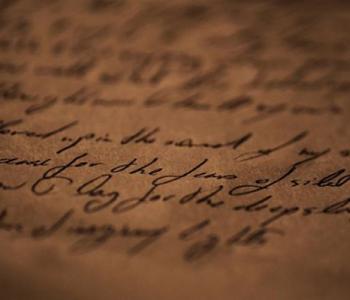 Close-up of cursive writing on paper