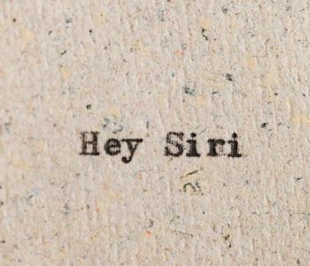 "Hey Siri" typed on parchment paper